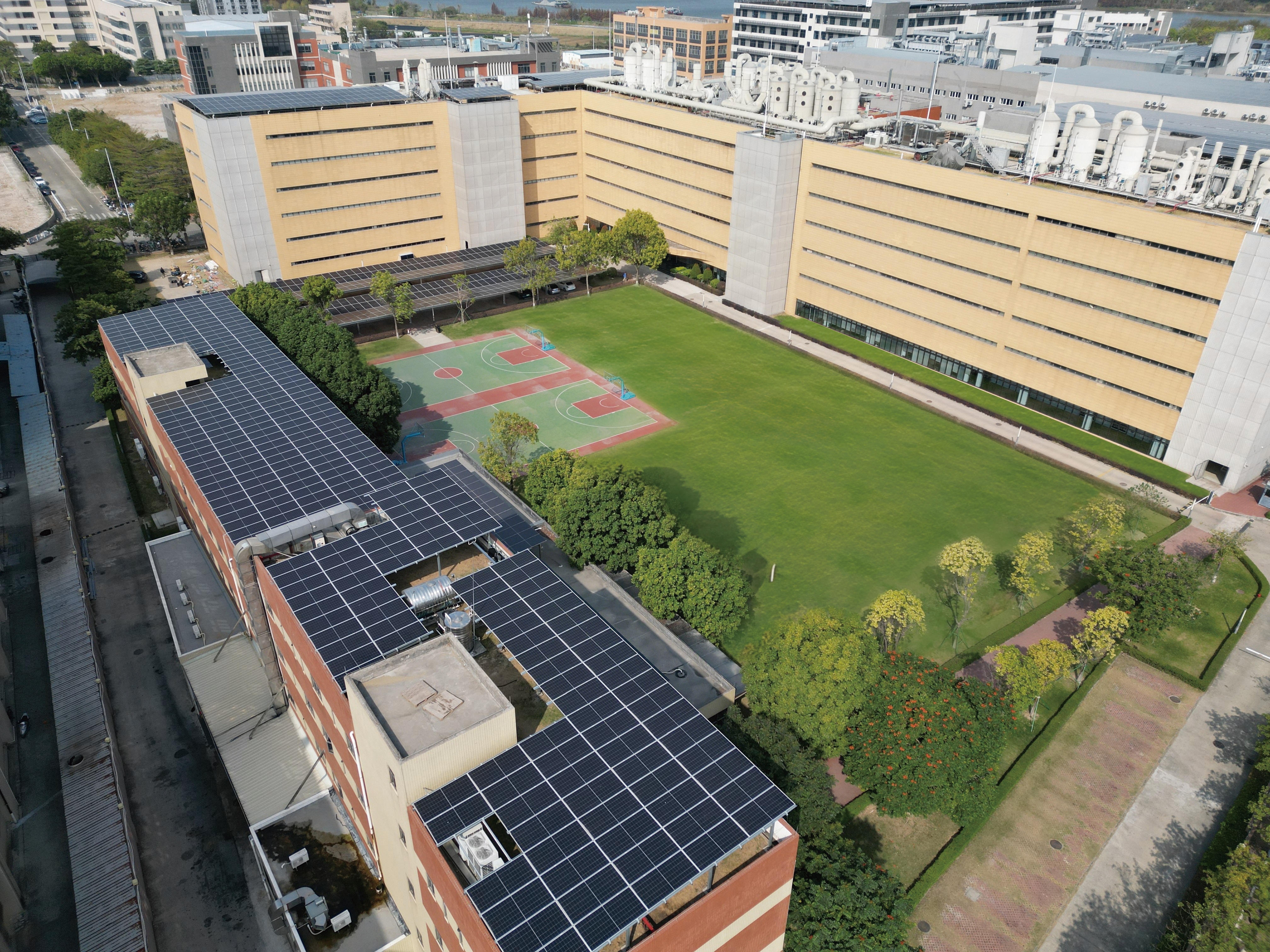 Foshan Industrial Centre and rooftop solar panels; brand image.
